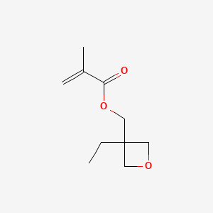 Chemical structure of (3-Ethyloxetan-3-yl)methyl 2-methylprop-2-enoate