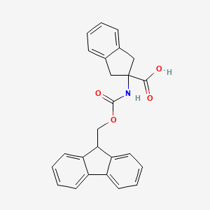 Chemical structure of 2-((((9H-Fluoren-9-yl)methoxy)carbonyl)amino)-2,3-dihydro-1H-indene-2-carboxylic acid