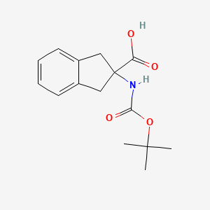 Chemical structure of 2-((tert-Butoxycarbonyl)amino)-2,3-dihydro-1H-indene-2-carboxylic acid
