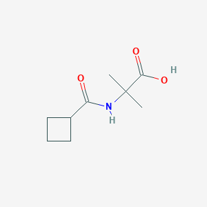 Chemical structure of 2-(Cyclobutanecarboxamido)-2-methylpropanoic acid