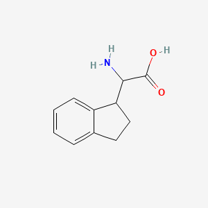 Chemical structure of 2-Amino-2-(2,3-dihydro-1H-inden-1-yl)acetic acid