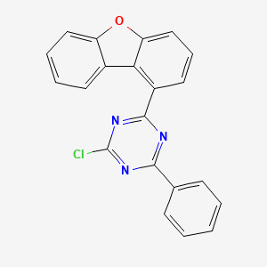 Chemical structure of 2-Chloro-4-(1-dibenzofuranyl)-6-phenyl-1,3,5-triazine
