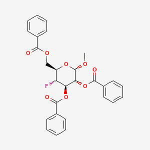 Chemical structure of 6-((Benzoyloxy)methyl)-5-fluoro-2-methoxytetrahydro-2H-pyran-3,4-diyl dibenzoate