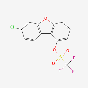 Chemical structure of 7-Chloro-1-dibenzofuran triflate