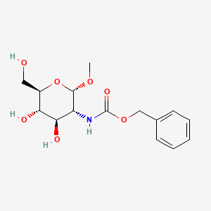 Chemical structure of Benzyl ((2S,3R,4R,5S,6R)-4,5-dihydroxy-6-(hydroxymethyl)-2-methoxytetrahydro-2H-pyran-3-yl)carbamate