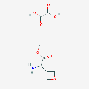 Chemical structure of Methyl 2-amino-2-(oxetan-3-yl)acetate; oxalic acid