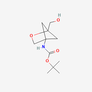 Chemical structure of tert-Butyl (1-(hydroxymethyl)-2-oxabicyclo[2.1.1]hexan-4-yl)carbamate