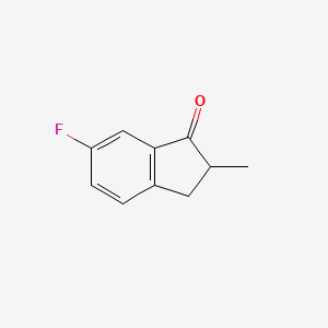 Chemical structure of 6-Fluoro-2-methyl-1-indanone