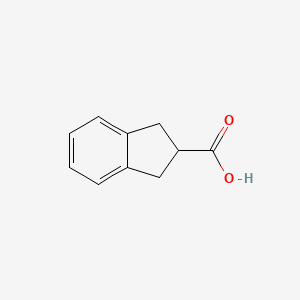 Chemical structure of 2-Indancarboxylic Acid