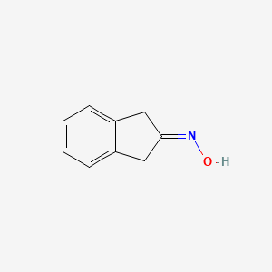 Chemical structure of 2-Indanone oxime