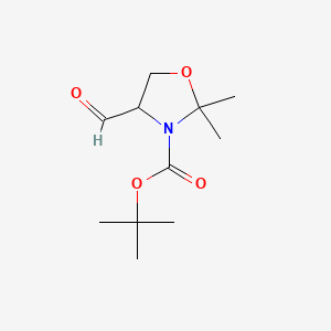 Chemical structure of 3-Boc-2,2-dimethyloxazolidine-4-carboxaldehyde, (A+-)-