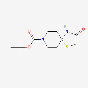 Chemical structure of tert-Butyl 3-oxo-1-thia-4,8-diazaspiro[4.5]decane-8-carboxylate