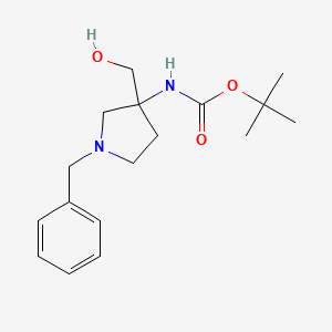 Chemical structure of tert-butyl 1-benzyl-3-(hydroxymethyl)pyrrolidin-3-ylcarbamate