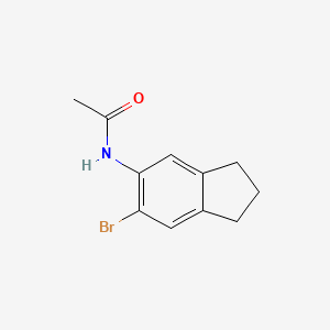 Chemical structure of 5-Acetamido-6-bromoindan