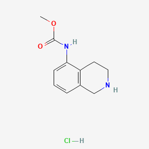 Chemical structure of Methyl N-(1,2,3,4-tetrahydroisoquinolin-5-yl)carbamate hydrochloride