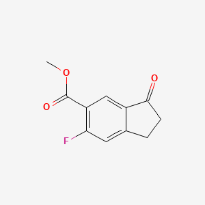 Chemical structure of Methyl 6-fluoro-3-oxo-2,3-dihydro-1H-indene-5-carboxylate