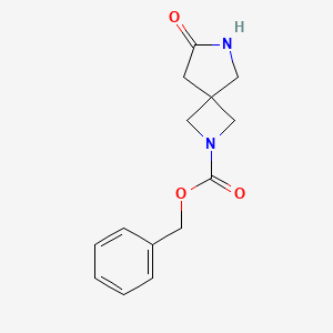 Chemical structure of Benzyl 7-oxo-2,6-diazaspiro[3.4]octane-2-carboxylate
