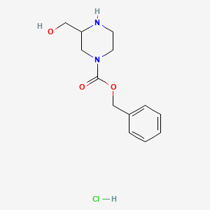Chemical structure of Benzyl 3-(hydroxymethyl)piperazine-1-carboxylate hydrochloride