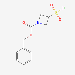 Chemical structure of benzyl 3-(chlorosulfonyl)azetidine-1-carboxylate