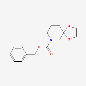 Chemical structure of Benzyl 1,4-dioxa-7-azaspiro[4.5]decane-7-carboxylate