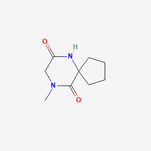 Chemical structure of 9-methyl-6,9-diazaspiro[4.5]decane-7,10-dione