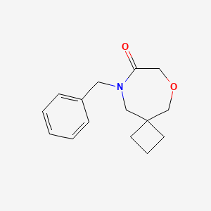 Chemical structure of 9-benzyl-6-oxa-9-azaspiro[3.6]decan-8-one