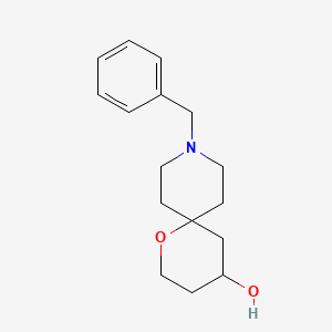 Chemical structure of 9-benzyl-1-oxa-9-azaspiro[5.5]undecan-4-ol
