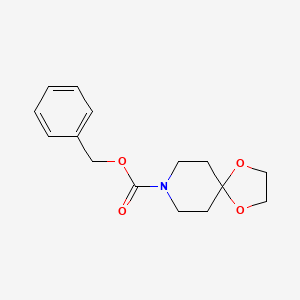 Chemical structure of Benzyl 1,4-dioxa-8-azaspiro[4.5]decane-8-carboxylate