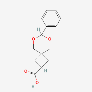 Chemical structure of 7-phenyl-6,8-dioxaspiro[3.5]nonane-2-carboxylic acid