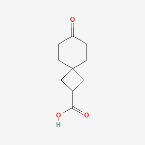 Chemical structure of 7-oxospiro[3.5]nonane-2-carboxylic acid