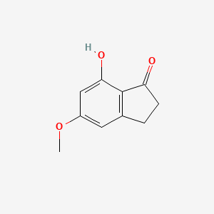 Chemical structure of 7-Hydroxy-5-methoxy-2,3-dihydro-1H-inden-1-one