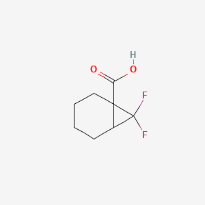Chemical structure of 7,7-difluorobicyclo[4.1.0]heptane-1-carboxylic acid