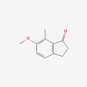 Chemical structure of 6-Methoxy-7-methyl-2,3-dihydro-1H-inden-1-one