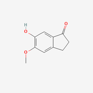 Chemical structure of 6-Hydroxy-5-methoxy-2,3-dihydro-1H-inden-1-one