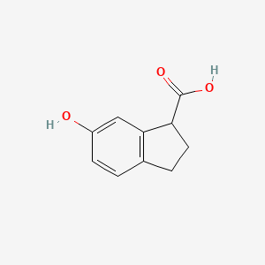 Chemical structure of 6-Hydroxy-2,3-dihydro-1H-indene-1-carboxylic acid