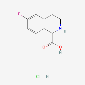 Chemical structure of 6-Fluoro-1,2,3,4-tetrahydroisoquinoline-1-carboxylic acid hydrochloride