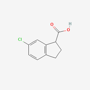 Chemical structure of 6-Chloro-2,3-dihydro-1H-indene-1-carboxylic acid