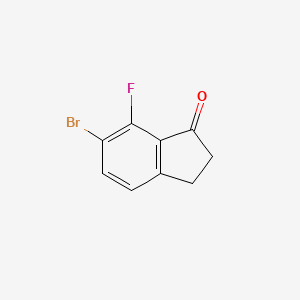 Chemical structure of 6-Bromo-7-fluoro-2,3-dihydro-1H-inden-1-one