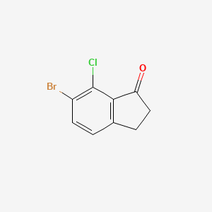Chemical structure of 6-Bromo-7-chloro-2,3-dihydro-1H-inden-1-one