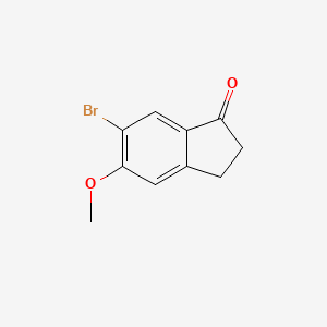 Chemical structure of 6-Bromo-5-methoxy-2,3-dihydro-1H-inden-1-one