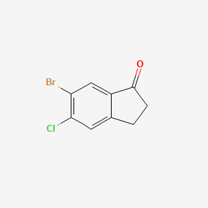 Chemical structure of 6-Bromo-5-chloro-2,3-dihydro-1H-inden-1-one