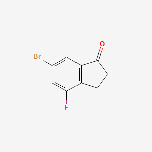 Chemical structure of 6-Bromo-4-fluoro-2,3-dihydro-1H-inden-1-one