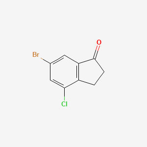 Chemical structure of 6-Bromo-4-chloro-2,3-dihydro-1H-inden-1-one