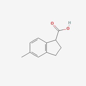Chemical structure of 5-Methyl-2,3-dihydro-1H-indene-1-carboxylic acid