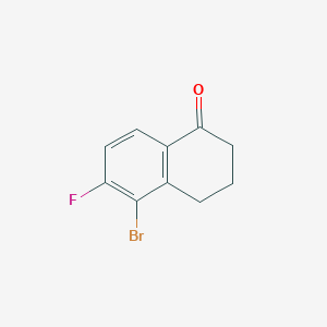 Chemical structure of 5-Bromo-6-fluoro-3,4-dihydronaphthalen-1(2H)-one