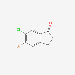Chemical structure of 5-Bromo-6-chloro-indan-1-one