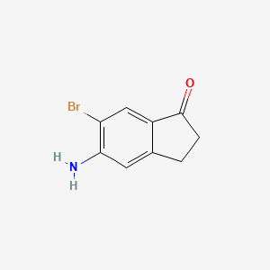 Chemical structure of 5-Amino-6-bromo-2,3-dihydro-1H-inden-1-one