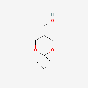Chemical structure of 5,9-Dioxaspiro[3.5]non-7-ylmethanol
