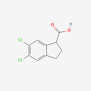 Chemical structure of 5,6-dichloro-2,3-dihydro-1H-indene-1-carboxylic acid