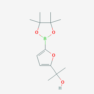 Chemical structure of 5-(1-Hydroxy-1-methylethyl)furan-2-boronic acid pinacol ester